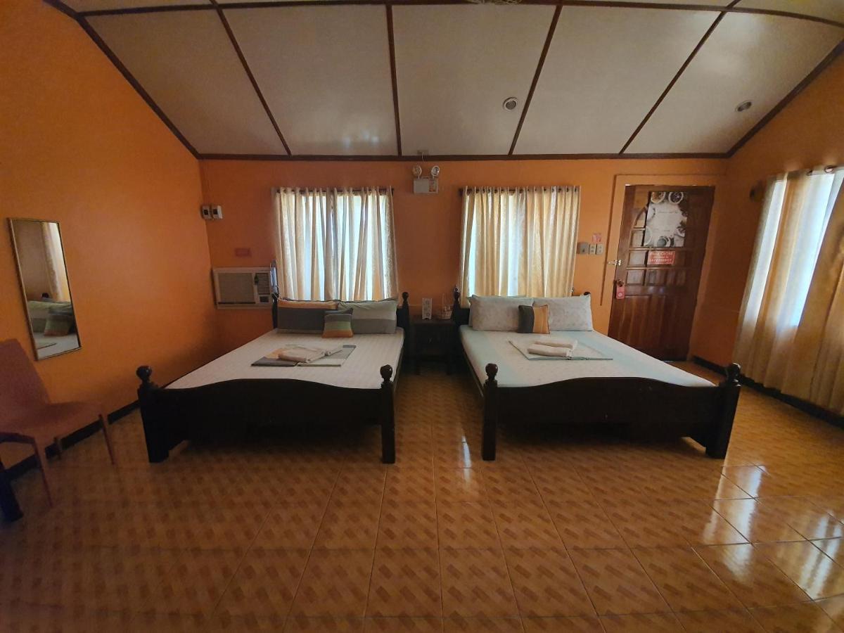 L & M Hearthstones Lodge Oslob Buitenkant foto