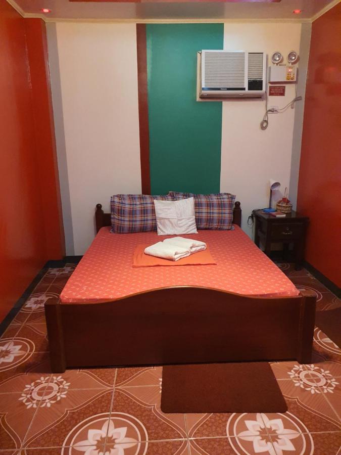 L & M Hearthstones Lodge Oslob Buitenkant foto