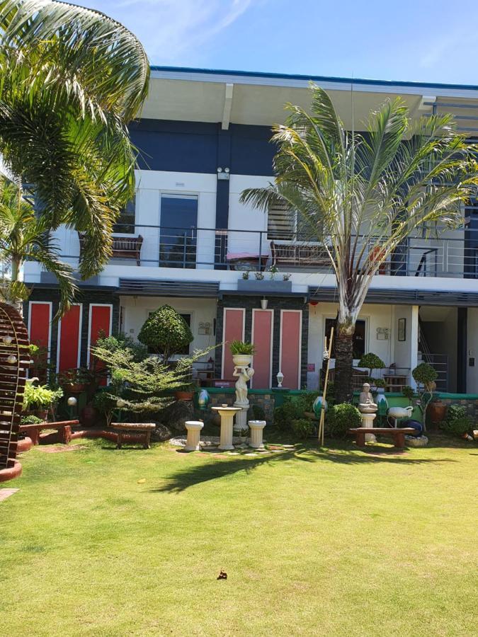 L & M Hearthstones Lodge Oslob Buitenkant foto