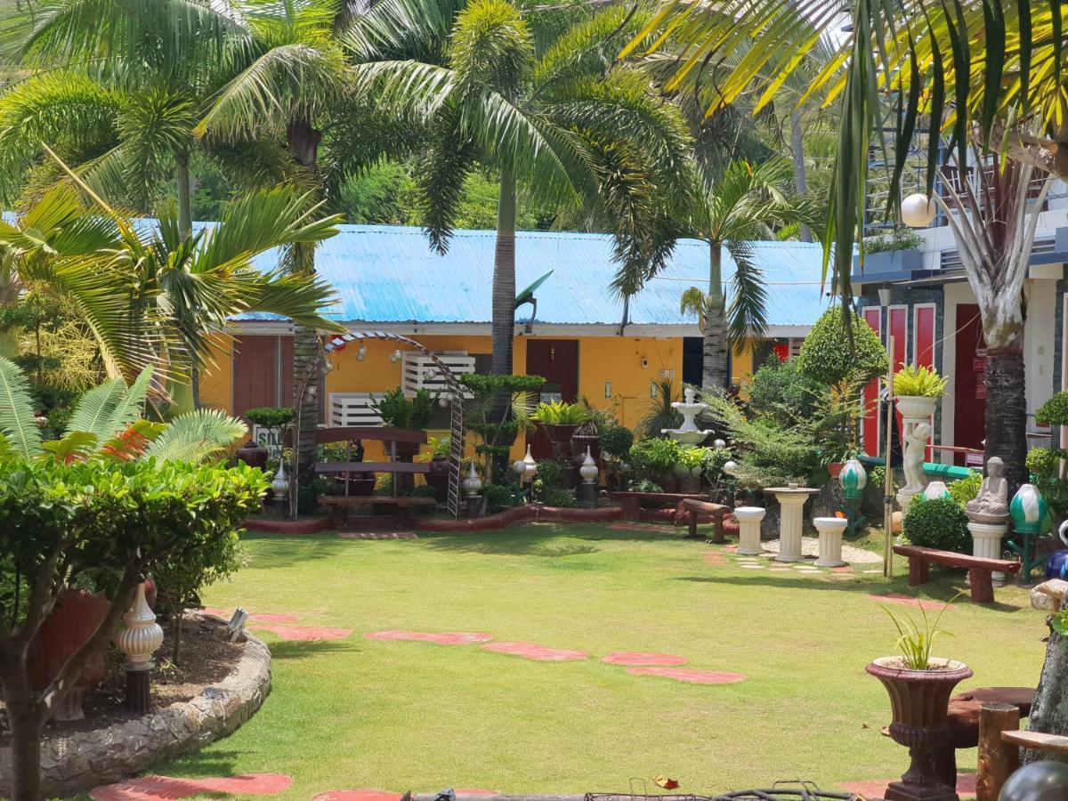 L & M Hearthstones Lodge Oslob Buitenkant foto