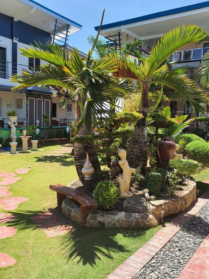 L & M Hearthstones Lodge Oslob Buitenkant foto