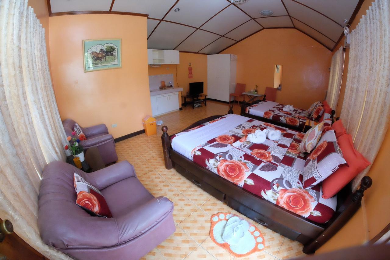 L & M Hearthstones Lodge Oslob Buitenkant foto