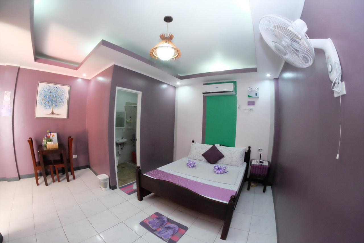 L & M Hearthstones Lodge Oslob Buitenkant foto