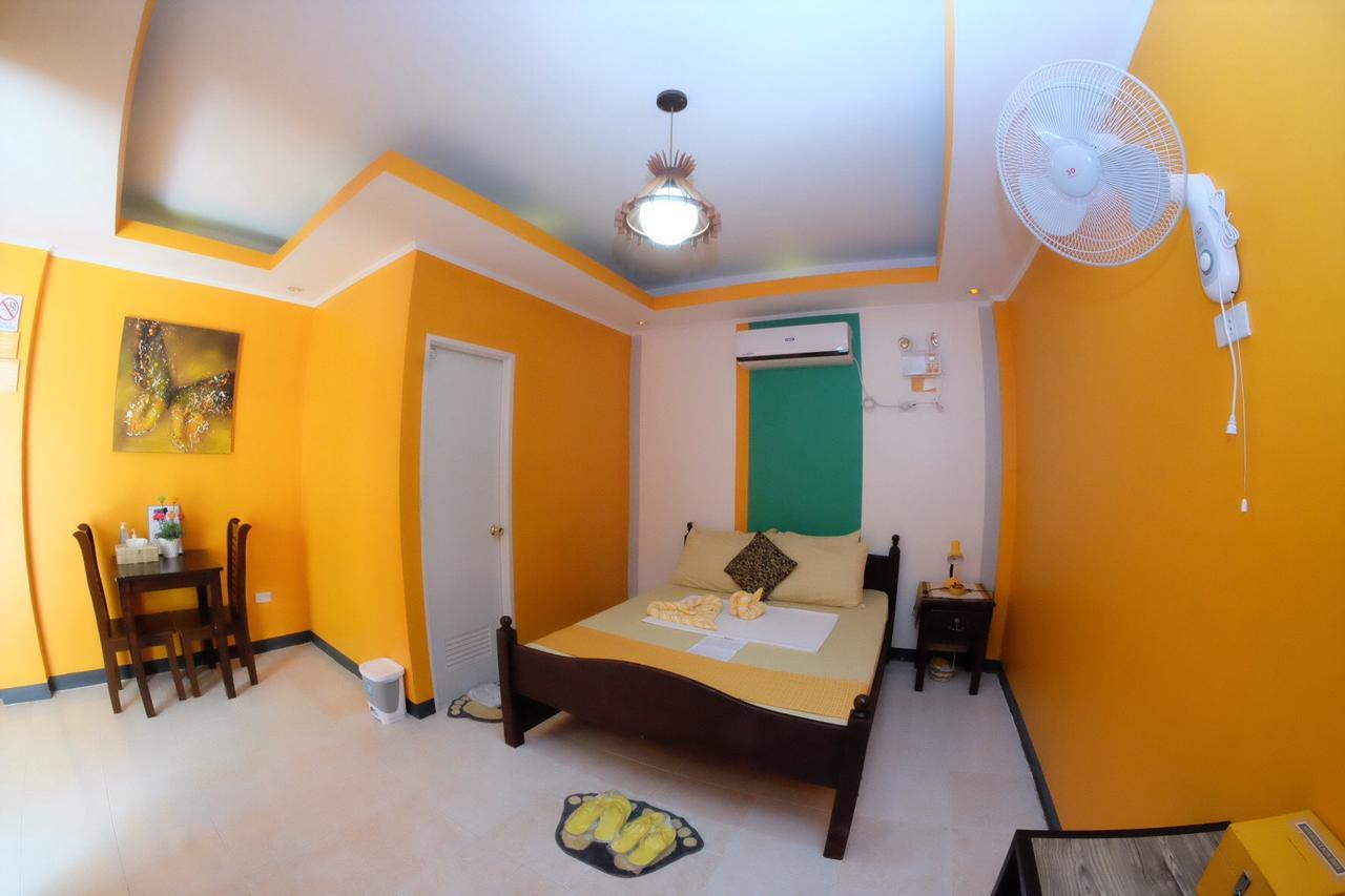 L & M Hearthstones Lodge Oslob Buitenkant foto