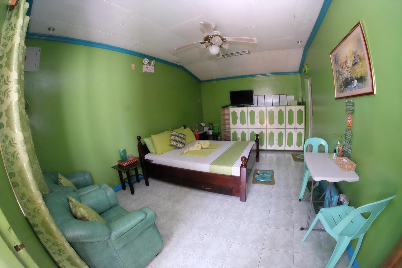 L & M Hearthstones Lodge Oslob Buitenkant foto