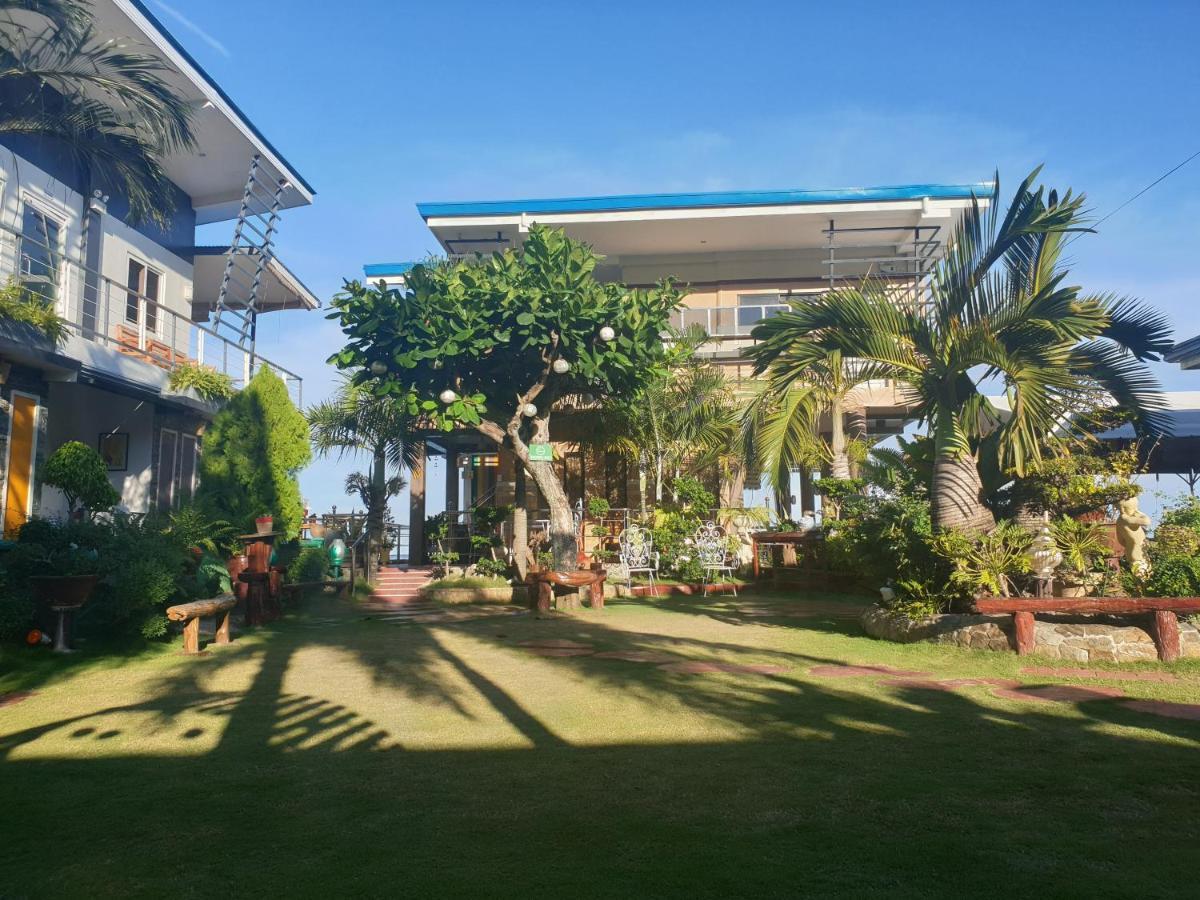 L & M Hearthstones Lodge Oslob Buitenkant foto